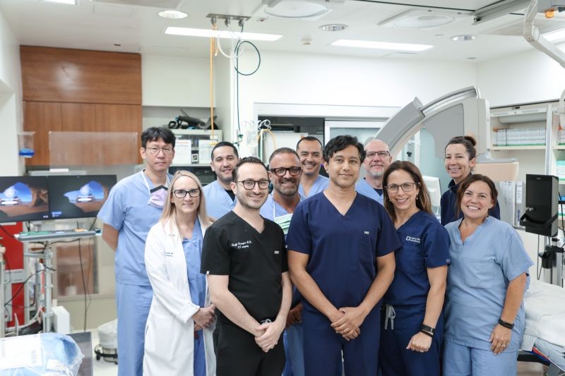 Dr. Sinha with the structural heart team in the cardiac catheterization lab